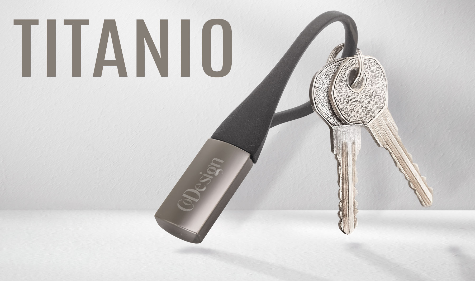 LLAVERO METAL/SILICONA “TITANIO”